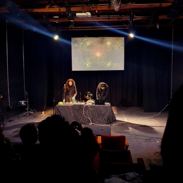 Losaquis live show at Teatro Tecal Bogotá Colombia blending alien ritual, ancestral symbolism, and immersive electronic music experience.