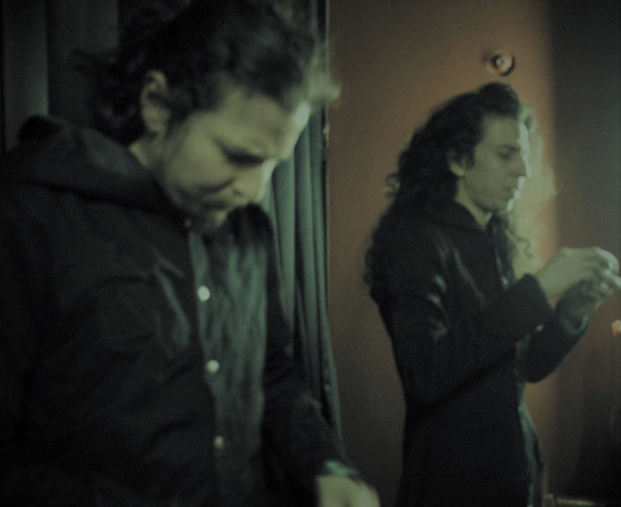 Backstage at Teatro Tecal, the alien tribe Losaquis prepare for their ritual show — painting their faces without masks, merging ancestral art, performance, and alien identity.